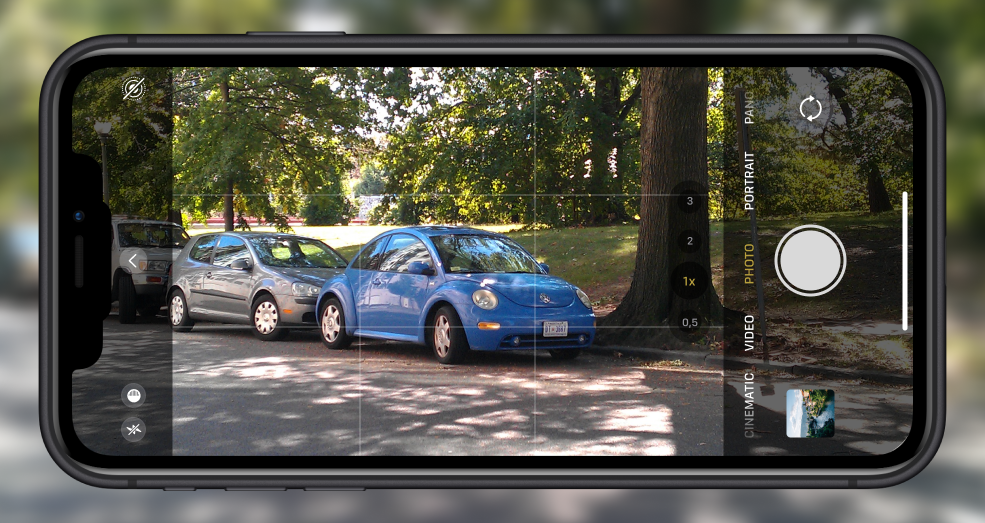 Screenshot of smartphone photographing a Volkswagen Beetle